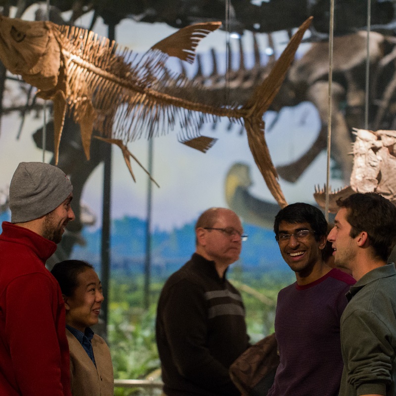 people laughing in an exhibition hall