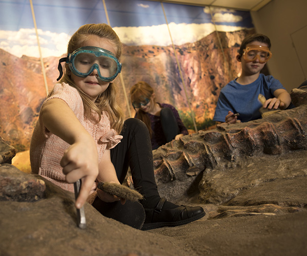 kids digging for bones