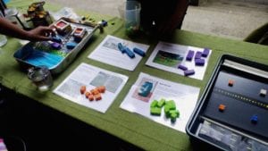 table top activity with sponges and paper