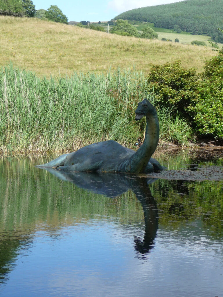 Loch Ness monster sculpture in the water
